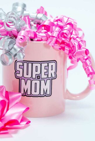 coffee mug that says super mom and has ribbons inside