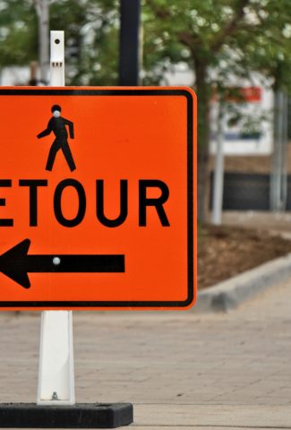 orange detour road sign