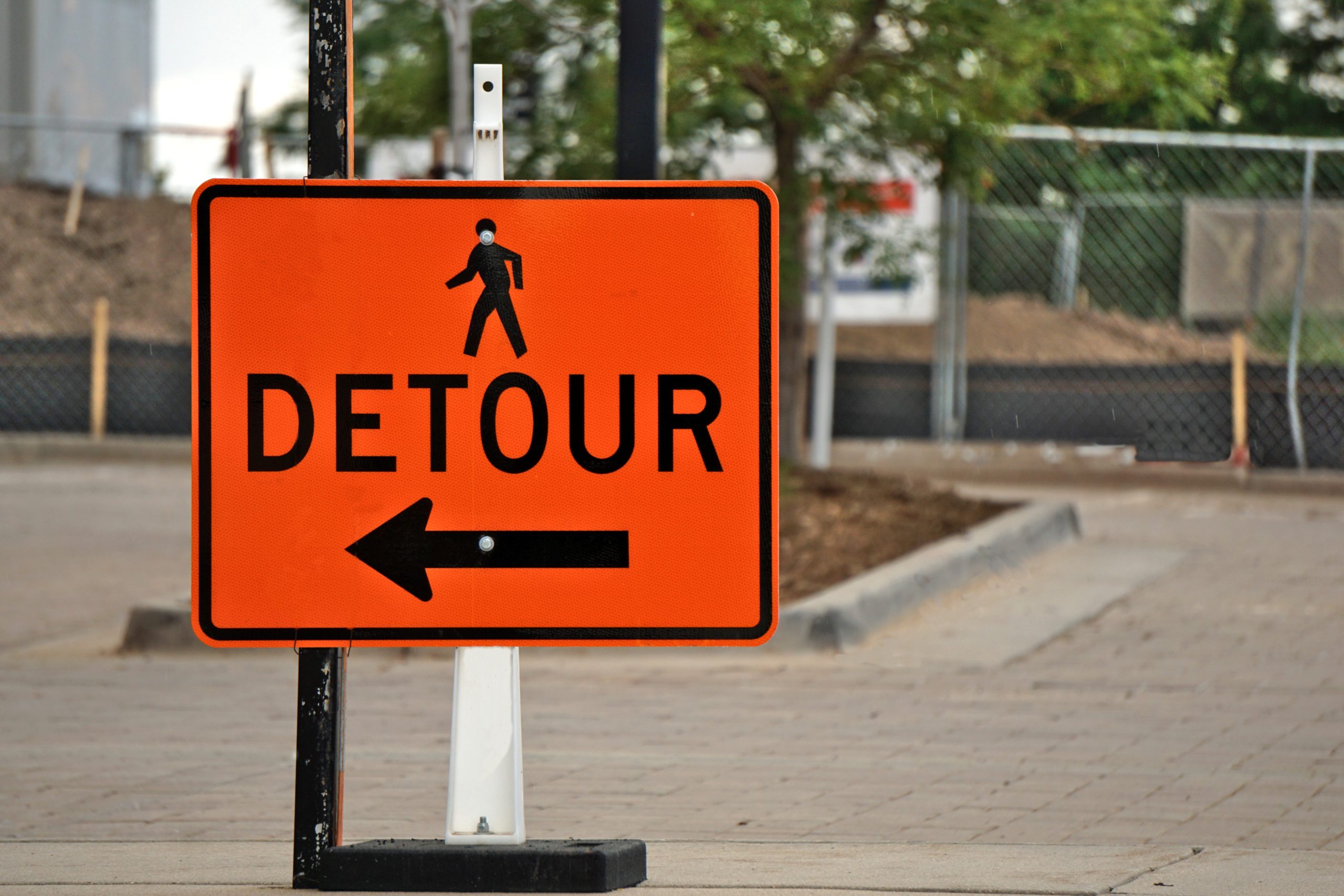 orange detour road sign